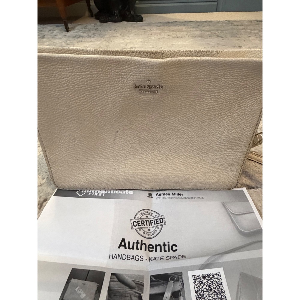Kate Spade New York Cream Pebbled Leather Triple Gusset Crossbody Bag Tassel